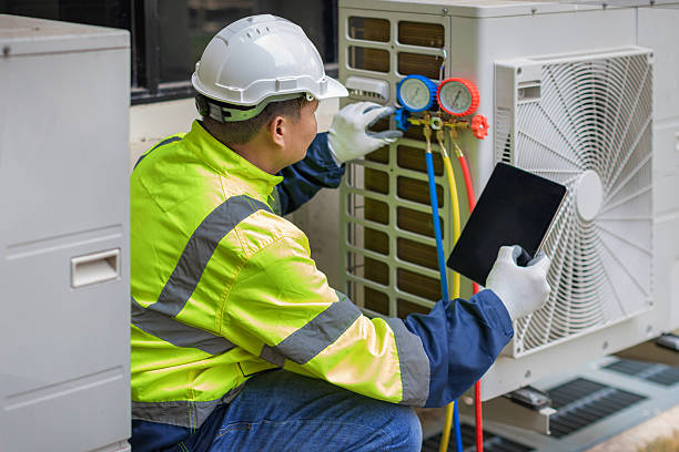 Professional Air Conditioning Repair technician working in Crown Point, IN